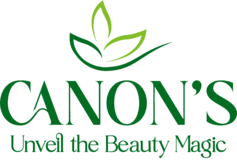 Logo with green leaves and text 'CANON'S Unveil the Beauty Magic' on a black background
